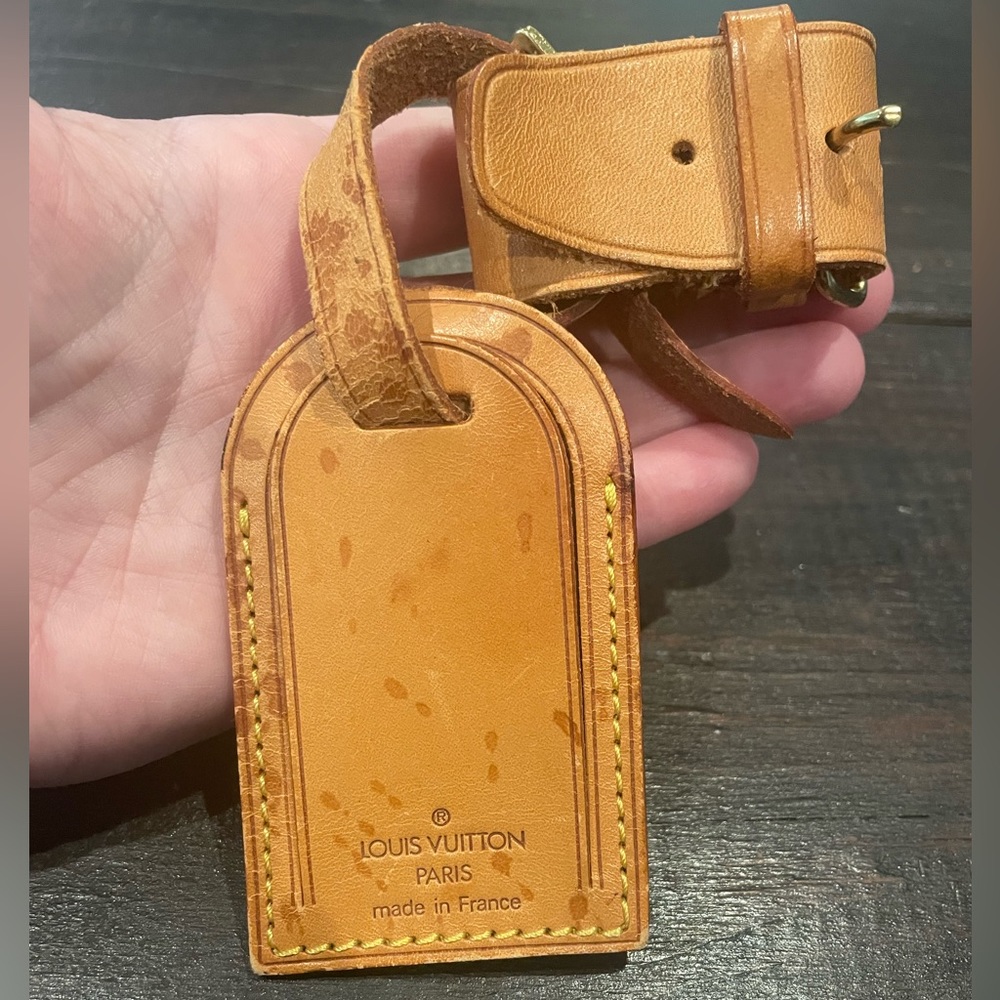 Louis Vuitton. Luggage Tag With Bag Strap Holder